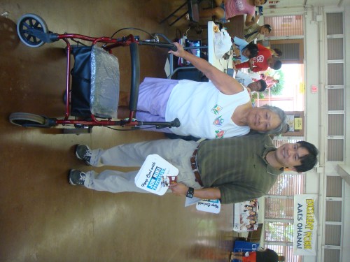 Rep. Jon Riki Karamatsu greeting residents