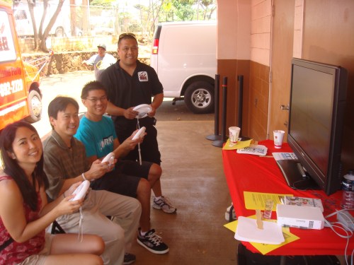 The team taking a break with Chris and his mobile video game bus