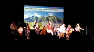 Cathy Lowenberg as one of the lead singers (in red) at the Hawaii Women's Legal Foundation's 25th Annual Gala Fundraiser